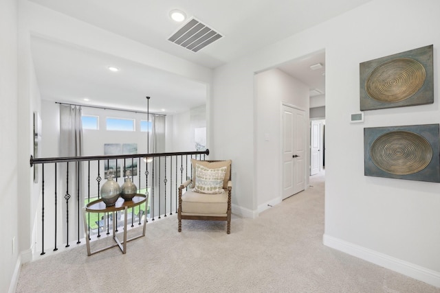 living area with baseboards, carpet flooring, recessed lighting, and visible vents