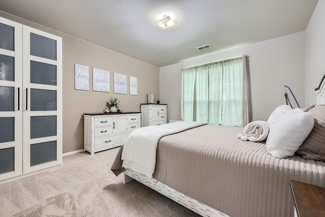 7520 Gangway Dr, Fort Worth, TX 76179 - bedroom featuring visible vents and light carpet