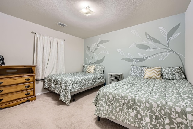7520 Gangway Dr, Fort Worth, TX 76179 - bedroom featuring carpet floors, a textured ceiling, and visible vents