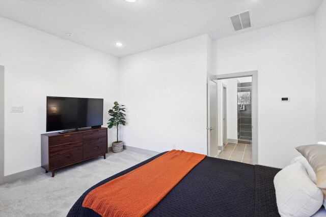 8613 Keeneland Dr, Fort Worth, TX 76120 - bedroom featuring visible vents, recessed lighting, baseboards, and light carpet