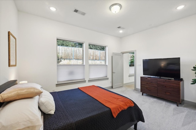 8613 Keeneland Dr, Fort Worth, TX 76120 - bedroom with visible vents, recessed lighting, baseboards, and light carpet