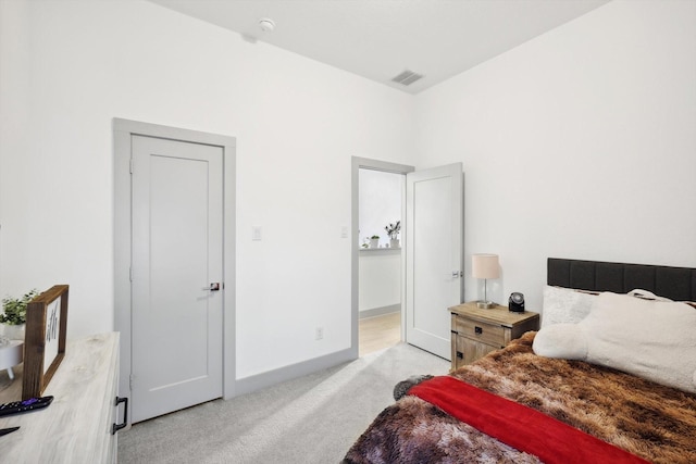 8613 Keeneland Dr, Fort Worth, TX 76120 - bedroom with visible vents, baseboards, and light colored carpet