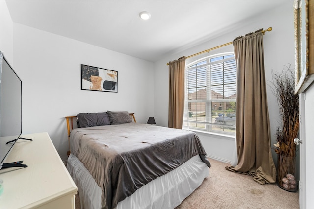 859 Sitwell Dr, Fate, TX 75087 - bedroom with baseboards and light carpet