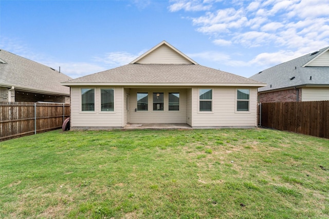 859 Sitwell Dr, Fate, TX 75087 - rear view of house with a patio, a fenced backyard, and a yard