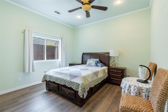 bedroom with crown molding, recessed lighting, visible vents, and dark wood finished floors
