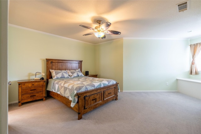 bedroom featuring visible vents, carpet, and crown molding