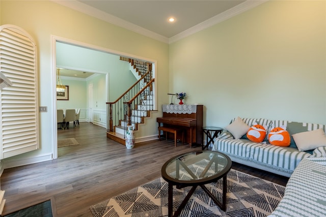 living room with ornamental molding, stairs, wood finished floors, baseboards, and recessed lighting