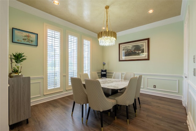 dining space with an inviting chandelier, plenty of natural light, a decorative wall, and dark wood-type flooring