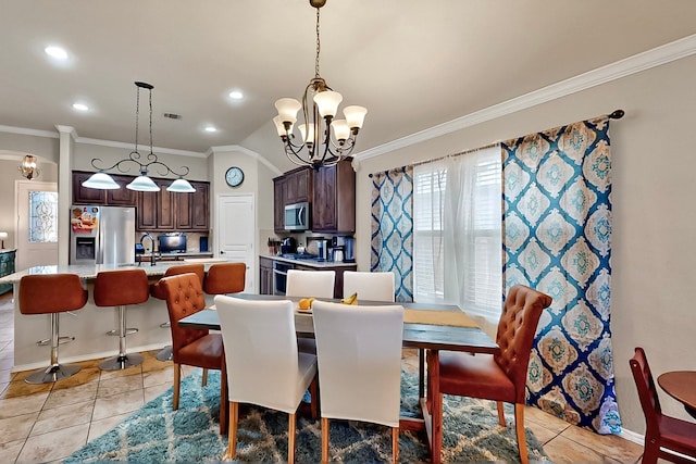 733 Ravenwood Dr, Saginaw, TX 76179 - dining space featuring ornamental molding, a chandelier, light tile patterned flooring, and recessed lighting