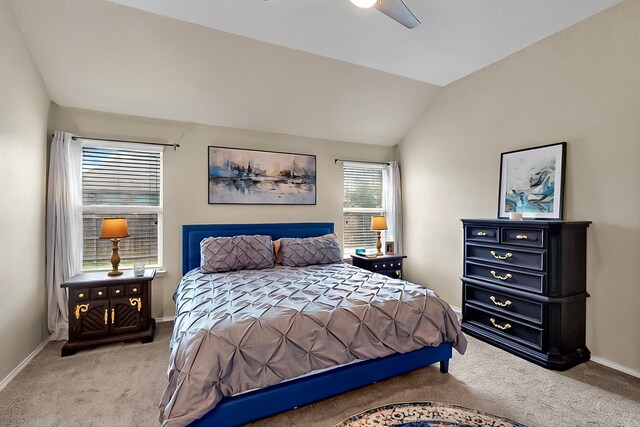 733 Ravenwood Dr, Saginaw, TX 76179 - bedroom featuring carpet flooring, baseboards, vaulted ceiling, and ceiling fan