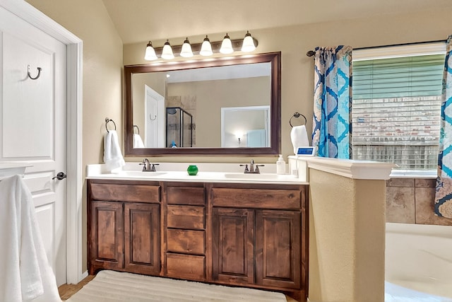 733 Ravenwood Dr, Saginaw, TX 76179 - bathroom with a walk in shower and double vanity
