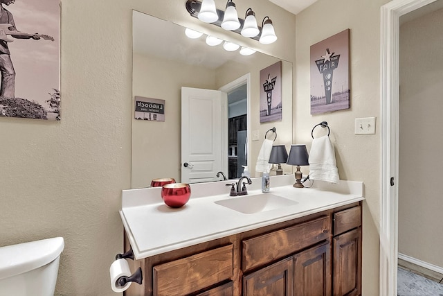 733 Ravenwood Dr, Saginaw, TX 76179 - half bath featuring toilet and vanity