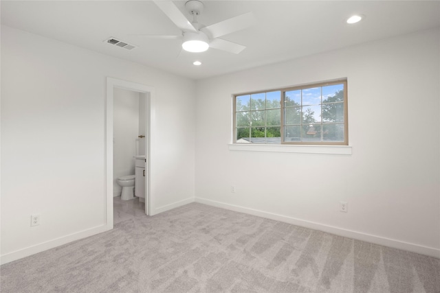 unfurnished bedroom with baseboards, carpet, recessed lighting, and visible vents