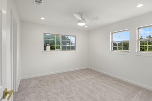 spare room with baseboards, carpet flooring, recessed lighting, and visible vents