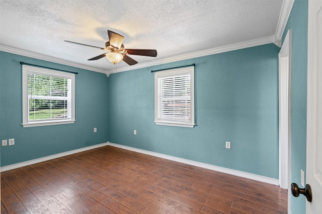 2311 Cedar Cir, Granbury, TX 76048 - unfurnished room featuring a textured ceiling, ornamental molding, dark wood-type flooring, a ceiling fan, and baseboards
