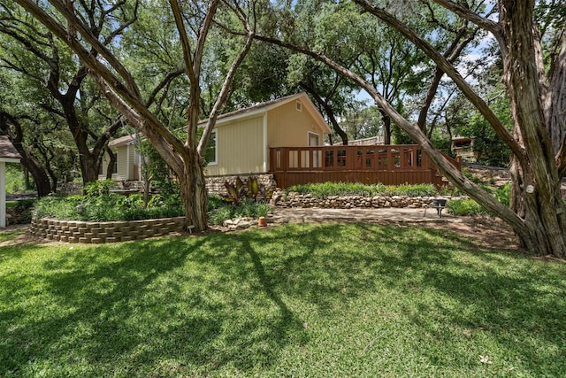 2311 Cedar Cir, Granbury, TX 76048 - view of grassy yard featuring a deck