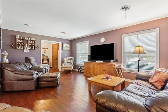 1324 Sunset St, Waco, TX 76710 - living area with visible vents, dark wood-style flooring, and a healthy amount of sunlight