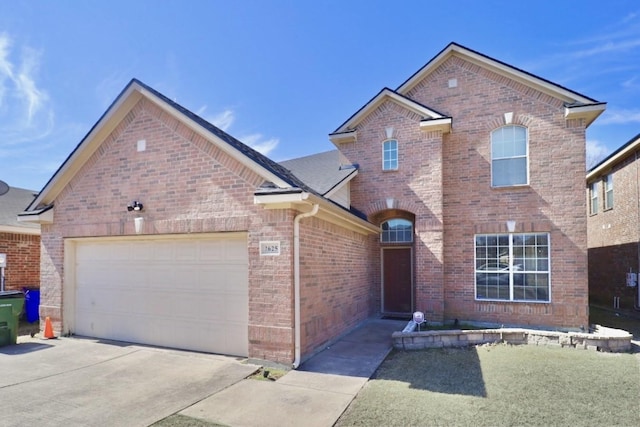 traditional home featuring concrete driveway, brick siding, and an attached garage