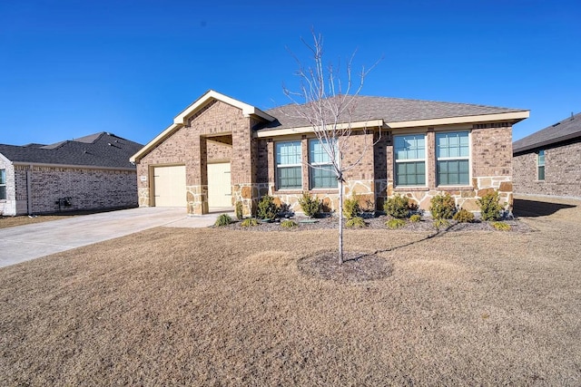 ranch-style home with a garage, stone siding, driveway, and brick siding