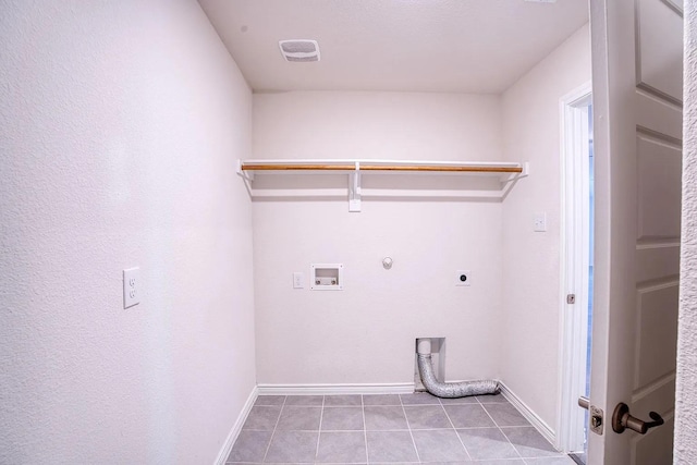 washroom featuring laundry area, electric dryer hookup, visible vents, hookup for a gas dryer, and baseboards