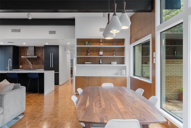 dining room with visible vents