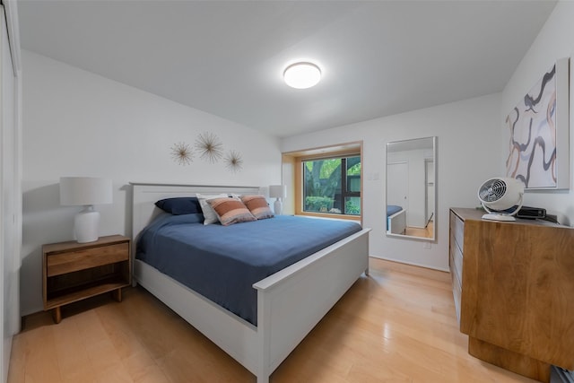 bedroom with light wood-style floors