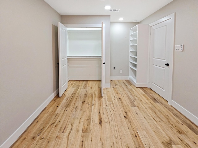8622 Eden Valley Ln, Dallas, TX 75217 - spacious closet featuring light wood-type flooring