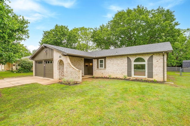 ranch-style home with a garage, fence, driveway, and brick siding