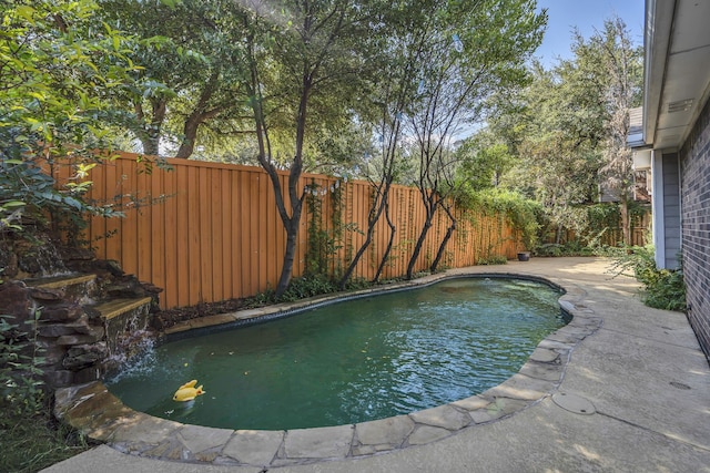 2630 Lakeforest Ct, Dallas, TX 75214 - view of swimming pool featuring a fenced backyard and a patio