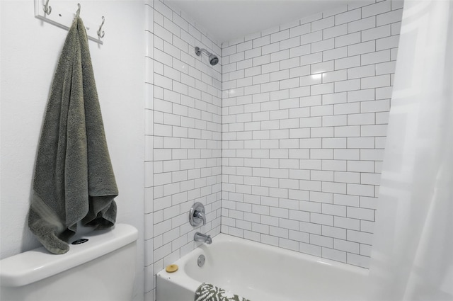 bathroom featuring toilet and shower / tub combination