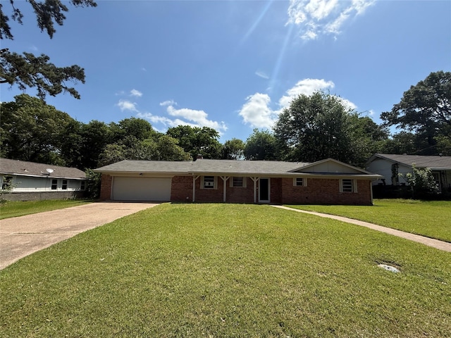 290 Dickard St, Hawkins, TX 75765 - ranch-style house featuring an attached garage, concrete driveway, a front lawn, and brick siding