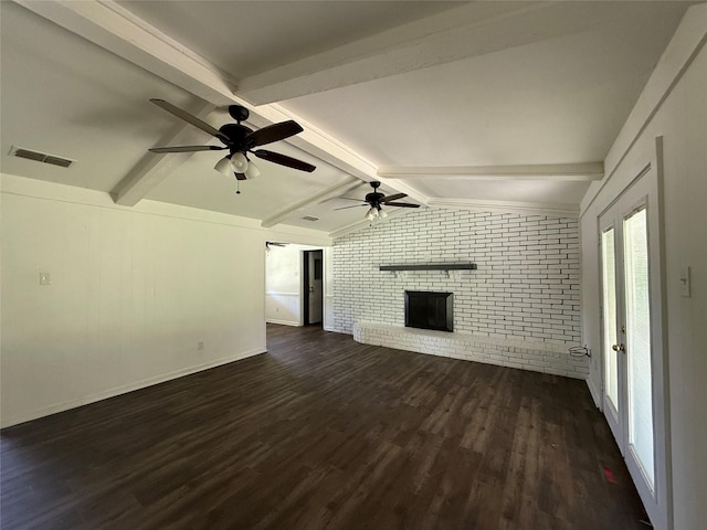 290 Dickard St, Hawkins, TX 75765 - unfurnished living room with a ceiling fan, brick wall, visible vents, a fireplace, and vaulted ceiling with beams