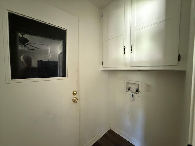 290 Dickard St, Hawkins, TX 75765 - washroom featuring baseboards, cabinet space, washer hookup, and dark wood finished floors