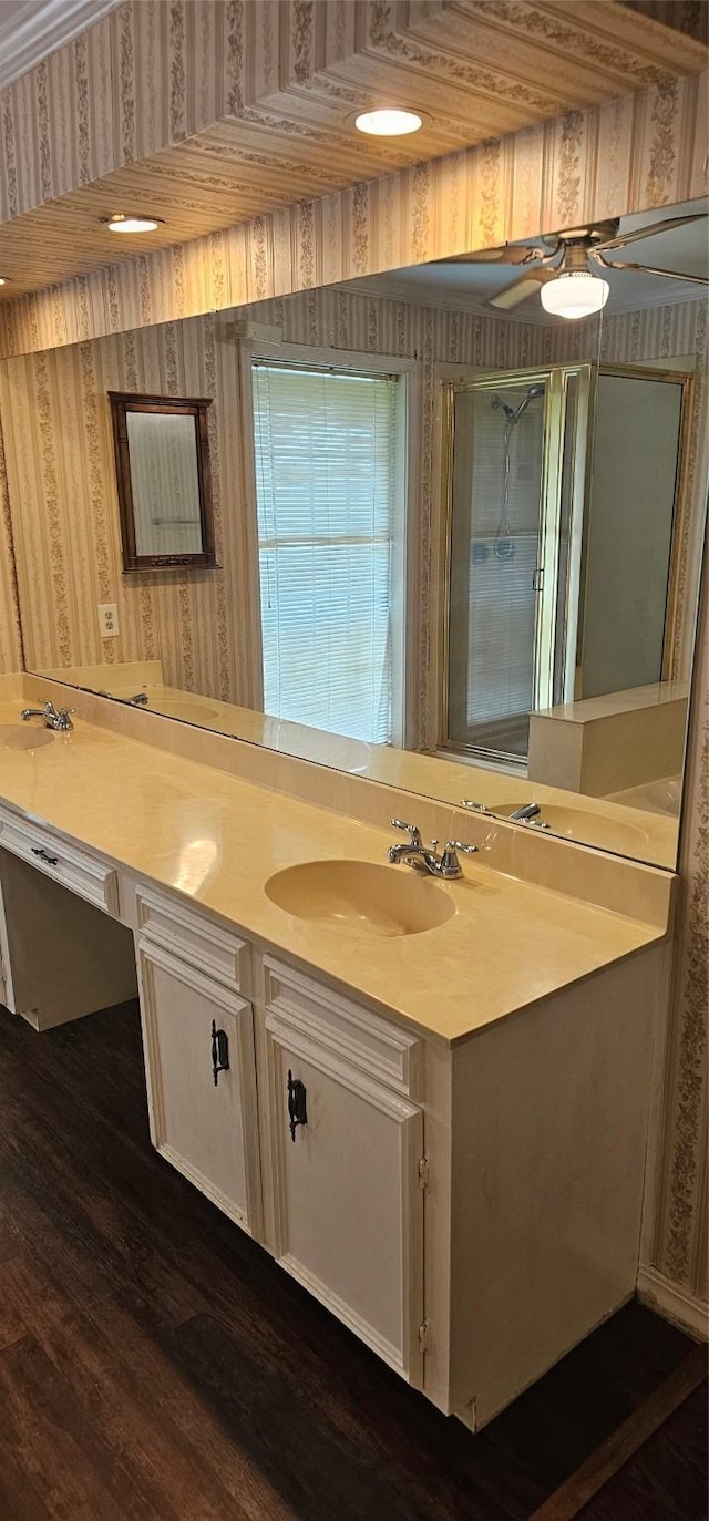 2 Woodfern Ln, Haughton, LA 71037 - bathroom with vanity, wood finished floors, wallpapered walls, an enclosed shower, and a ceiling fan