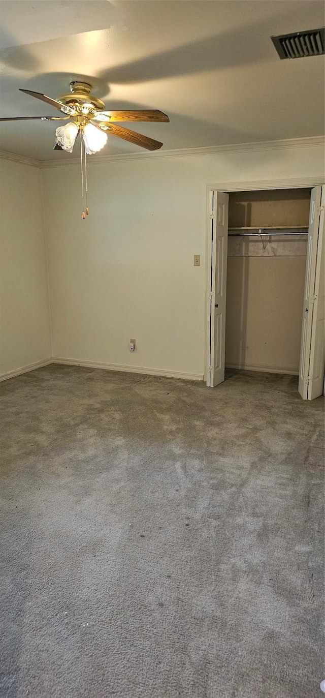 2 Woodfern Ln, Haughton, LA 71037 - unfurnished bedroom featuring carpet floors, a ceiling fan, a closet, and visible vents