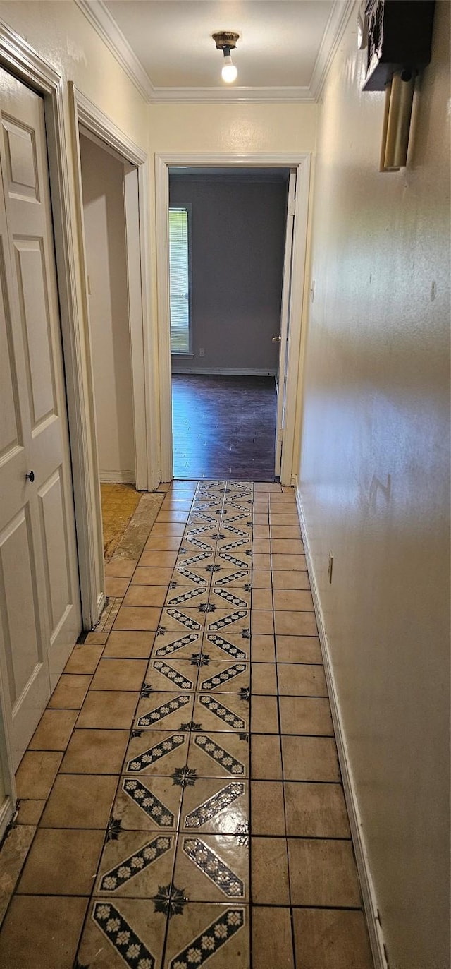 2 Woodfern Ln, Haughton, LA 71037 - hallway featuring baseboards, ornamental molding, and light tile patterned floors