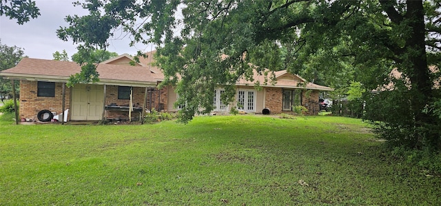 2 Woodfern Ln, Haughton, LA 71037 - view of yard featuring french doors