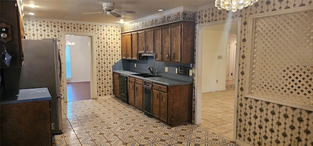 2 Woodfern Ln, Haughton, LA 71037 - kitchen featuring freestanding refrigerator, a sink, dark brown cabinetry, and wallpapered walls