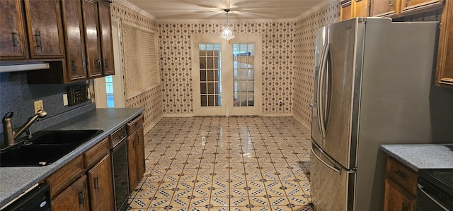 2 Woodfern Ln, Haughton, LA 71037 - kitchen featuring crown molding, a sink, dishwasher, freestanding refrigerator, and pendant lighting