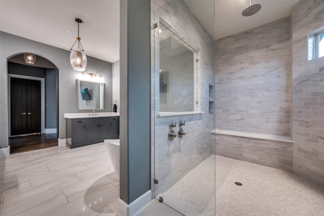 full bath featuring vanity and walk in shower