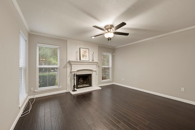 7510 Holly Hill Dr Unit 154, Dallas, TX 75231 - unfurnished living room featuring baseboards, ornamental molding, a fireplace with raised hearth, and a ceiling fan