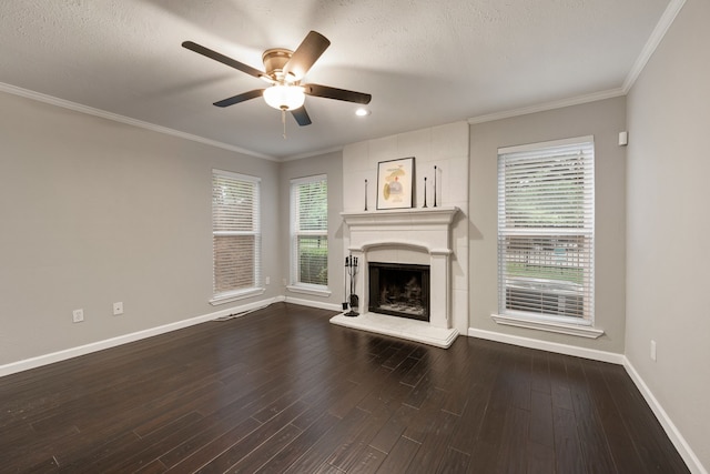 7510 Holly Hill Dr Unit 154, Dallas, TX 75231 - unfurnished living room with baseboards, ceiling fan, a wealth of natural light, and a fireplace