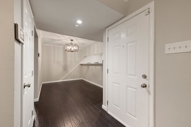 7510 Holly Hill Dr Unit 154, Dallas, TX 75231 - interior space with a chandelier and dark wood-style floors