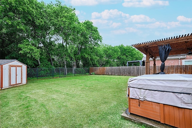 view of yard with a pergola, a hot tub, a storage shed, a fenced backyard, and an outdoor structure