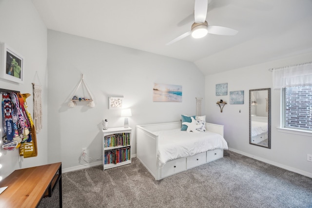 bedroom featuring baseboards, carpet, and vaulted ceiling