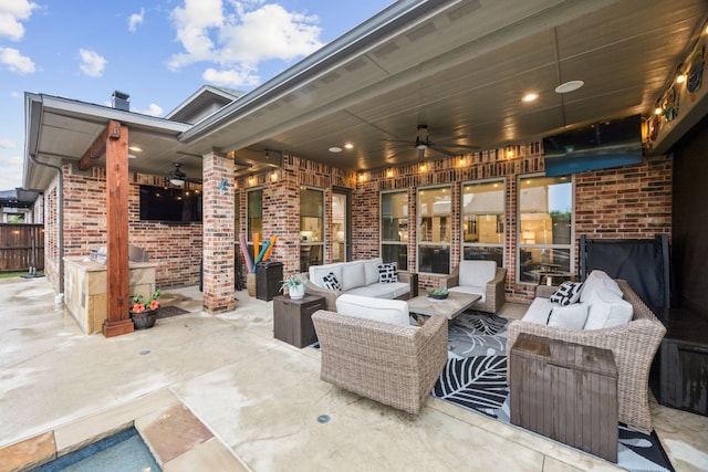 view of patio / terrace featuring outdoor lounge area and a ceiling fan