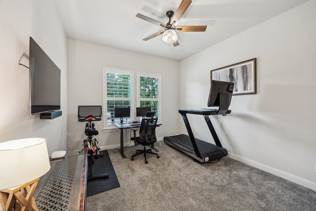 workout area featuring baseboards, carpet, and ceiling fan