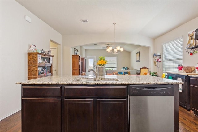 kitchen with dark brown cabinetry, visible vents, dishwasher, a sink, and dark wood-style floors