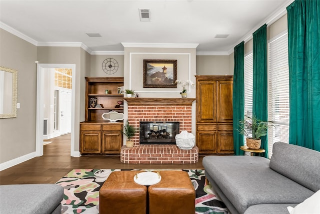 504 Glenbrook Ct, Southlake, TX 76092 - living area featuring visible vents, ornamental molding, baseboards, and dark wood-type flooring
