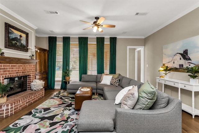 504 Glenbrook Ct, Southlake, TX 76092 - living room with a ceiling fan, visible vents, a fireplace, wood finished floors, and ornamental molding